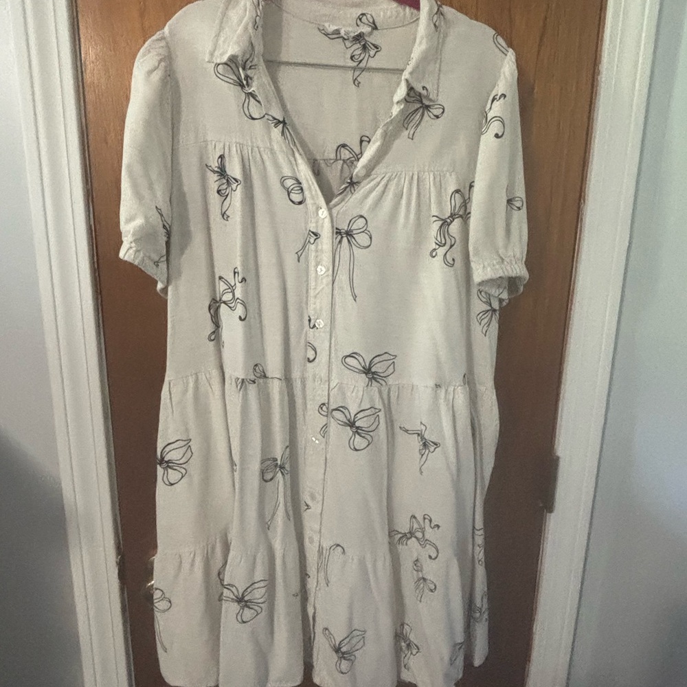 Jane and Delancey Cream Dress with Black Bow Pattern